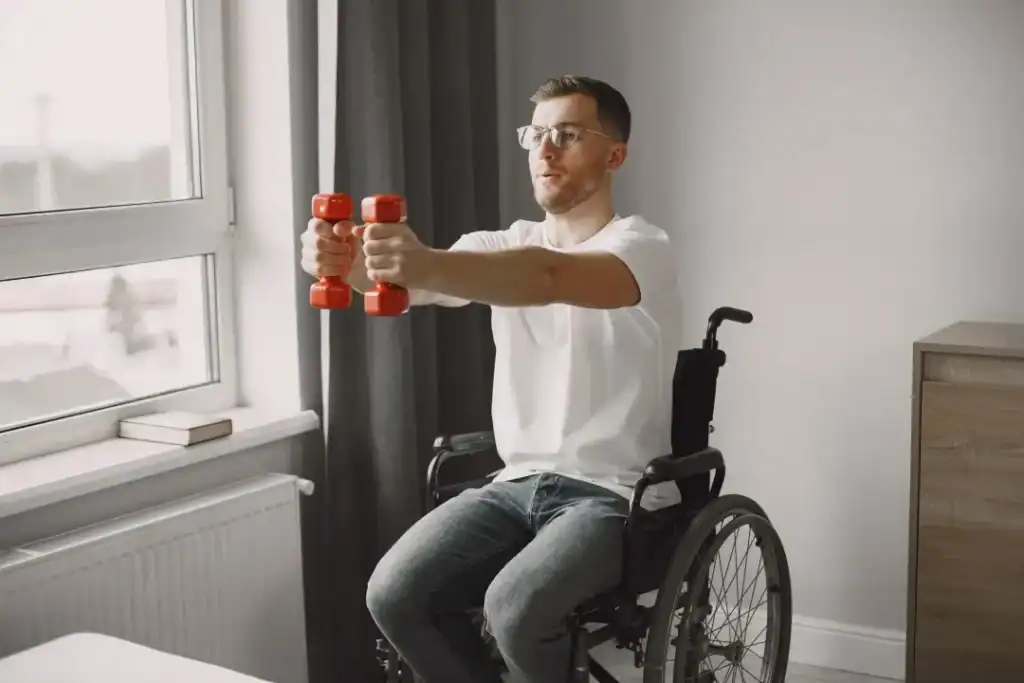 Empowering Weight Loss: A Comprehensive Guide for Individuals with Disabilities 1 Image of man doing exercise in his wheelchair to aid weight loss Willenhall