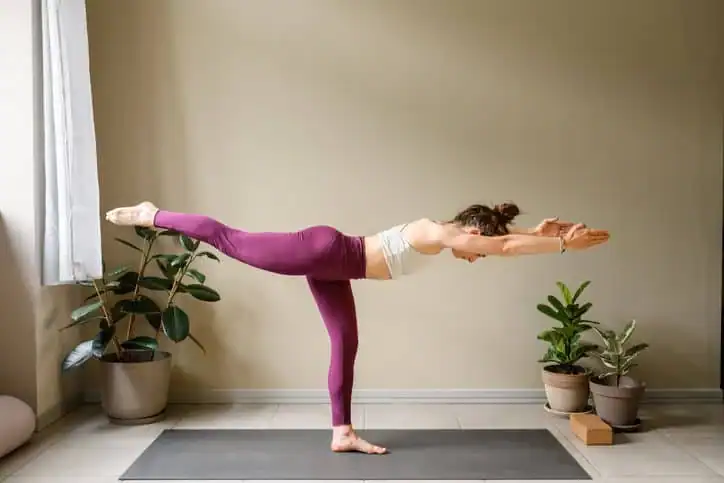 Achieving the Perfect Tone: How Often Should You Exercise for Results? 1 Woman doing Yoga exercise Willenhall to help with toning the body.
